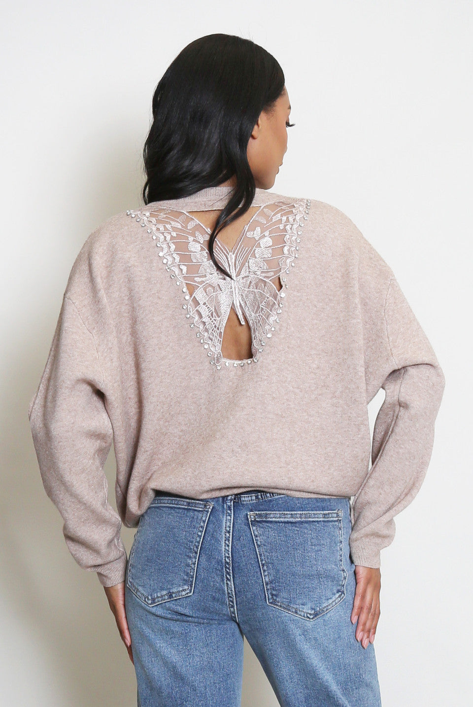 Fine knit jumper in taupe with lace cut out butterfly detail on back panel. 